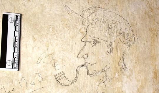 An army of servants and groundskeepers kept Knole House running for centuries, and many left their marks on the home. In narrow attic spaces, archaeologists found graffiti they left behind, including this sketch dating to 1963. (Courtesy National Trust)