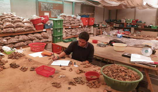 Graduate student Jorge Méndez records freshly excavated pottery sherds at the excavation’s on-site laboratory. Most were deliberately smashed in antiquity—hinting at abrupt cultural or political change. (Roger Atwood)