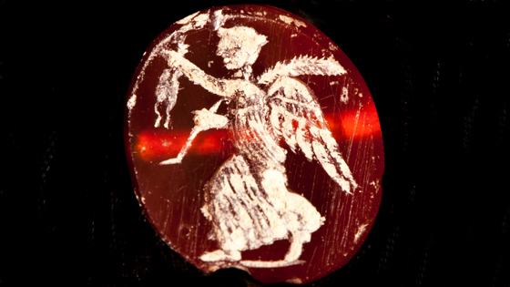 In addition to the architectural remains, the new excavations in the residential quarter have also uncovered personal items such as this carved carnelian gemstone depicting a winged figure.