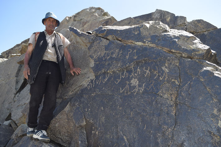 Shepherd Sanginov Khaitali, from the village of Shol near the Almosi Gorge, first encountered the Kushan inscription in the 1970s. In recent years he noted that the inscription was degraded, possibly due to earthquakes, and alerted archaeologists to the existence of the site.