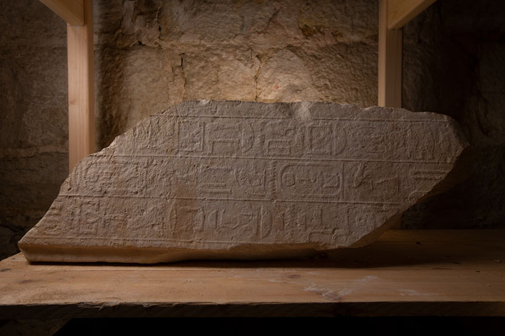 An inscription detailing Kairsu’s titles, including Overseer of the House of Life, was found in the burial complex and is shown here lying on its side.