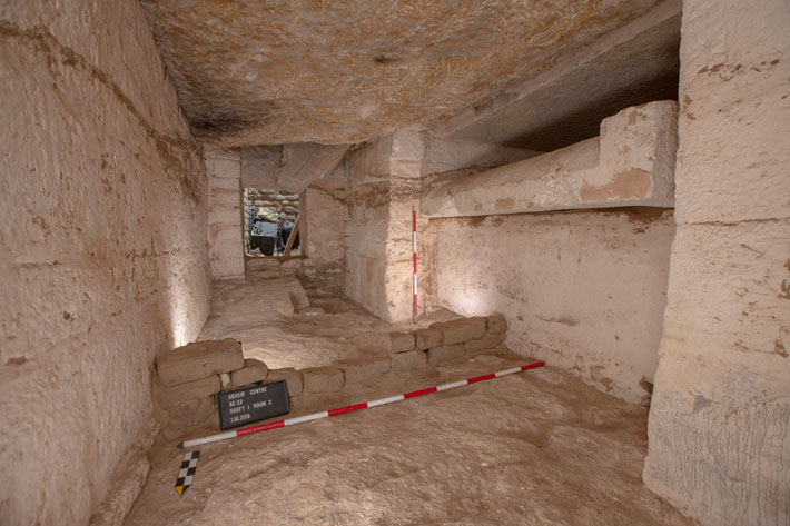 This view shows Kairsu's burial chamber shortly after its discovery. The official’s limestone sarcophagus can be seen on the upper right of the image.