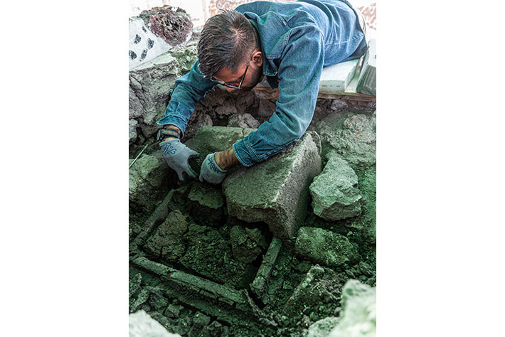 Archaeologists excavate a stone chest in the Templo Mayor, at the heart of the Aztec, or Mexica, capital of Tenochtitlan. (Photograph Mirsa Islas, courtesy Proyecto Templo Mayor)
