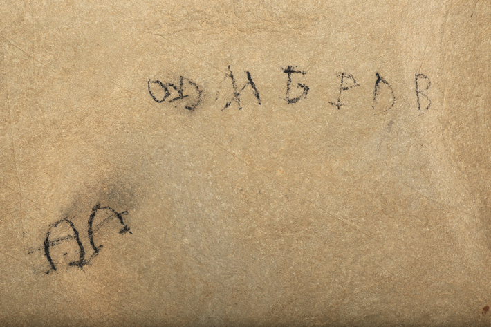 A historical inscription written in Cherokee characters on the ceiling of a cave in Alabama can be translated, in part, as “I am your grandson,” a phrase Cherokee might use to address their ancestors. 