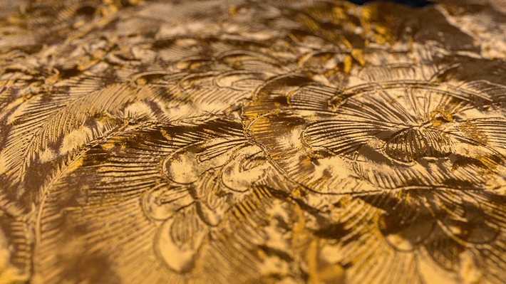 Detail of extremely finely engraved flower on a tiny ancient Korean gold artifact (Courtesy Gyeongju National Research Institute of Cultural Heritage)