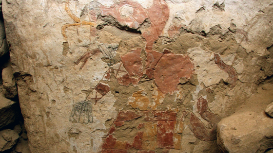  A painting on one of the pillars of the Temple of the Painted Pillars depicts a supernatural male figure with both human and animal characteristics. He is thought to be an attendant during the same ceremony in which the priestess participates. The ritual is depicted in a narrative format from the top to the bottom of the pillar. 