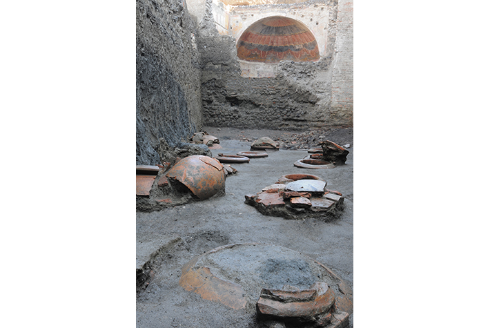 The wine cellar in the Villa of Augustus had large ceramic storage jars embedded in the floor in which the juice from crushed grapes was collected and fermented.